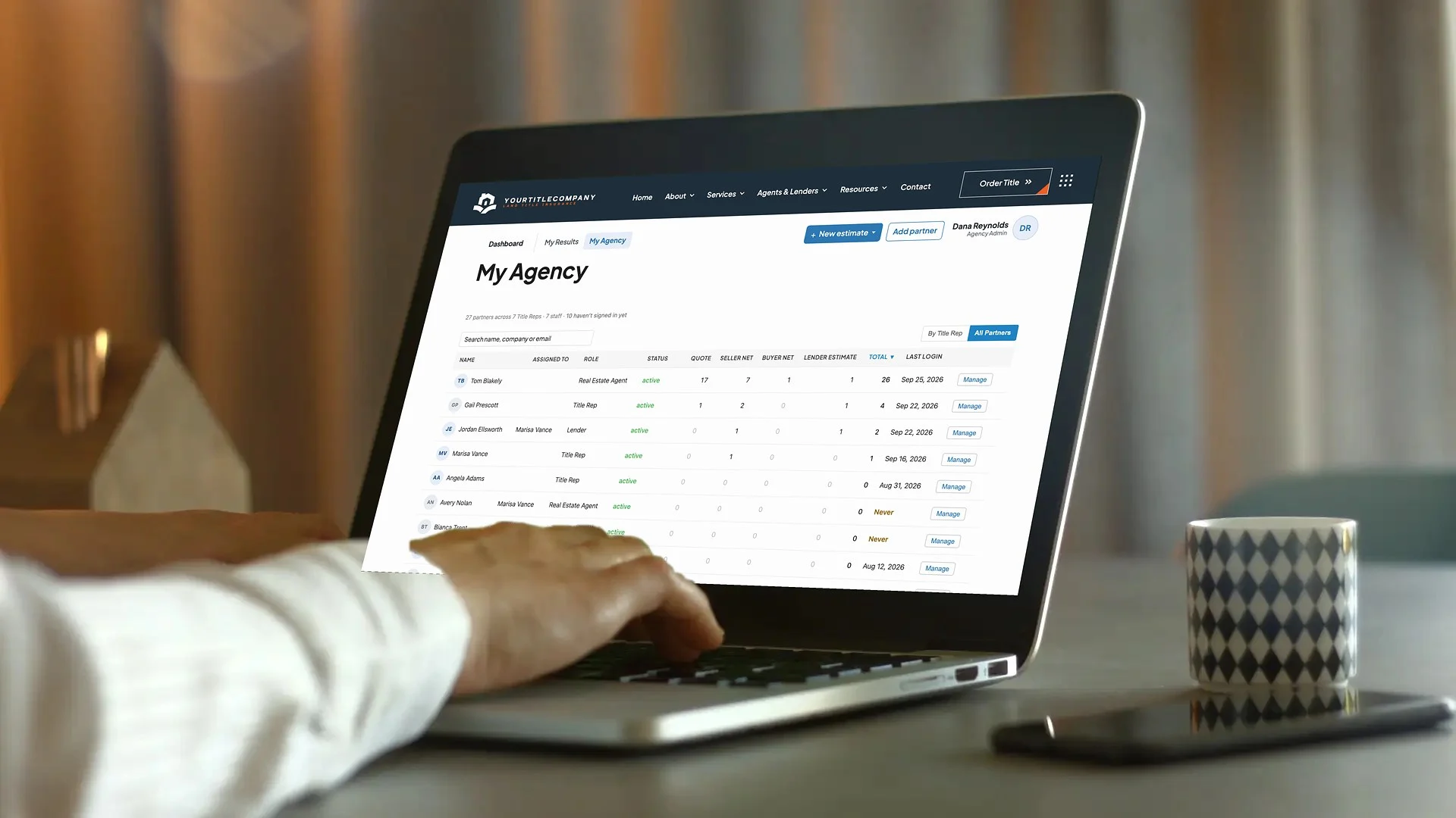 Partner Portal agency roster on a laptop